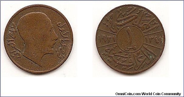 1 Fils - AH1349- 
KM#95
2.5000 g., Bronze, 19.5 mm. Obv: Head right Rev: Value in
center circle flanked by dates