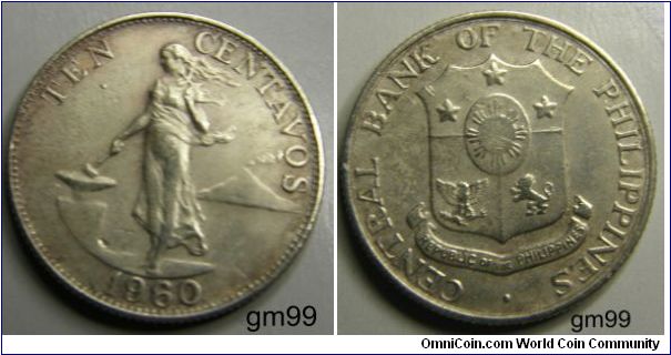 TEN CENTAVOS
Obverse: Woman walking left, anvil to left, volcano in background to right,
TEN CENTAVOS 
Reverse: Shield,
CENTRAL BANK OF THE PHILIPPINES