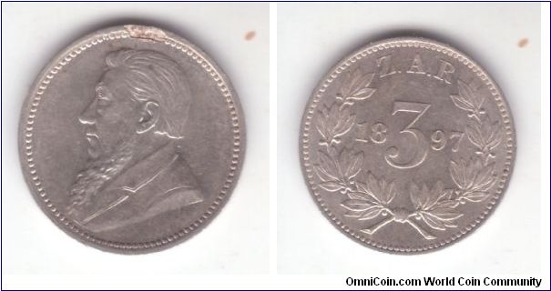 KM-3, ZAR 1897 3 pence; this one IS uncirculated but unfortunately with the flan defect on obverse;