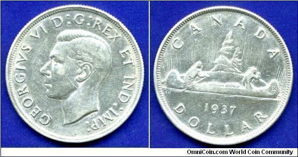 'Voyager' Dollar. 
George VI (1936-1952) Rex & Ind: Imp:.
Mintage 207,406 units.


Ag800f. 23,32gr.