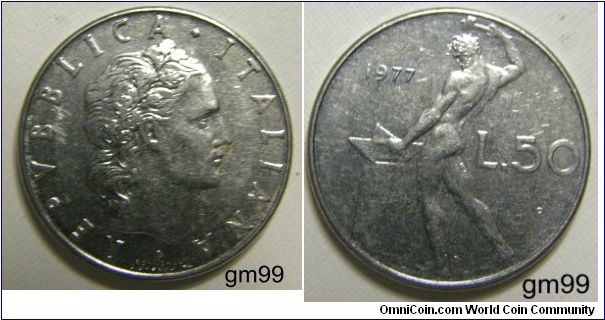 50 Lire (Stainless Steel) : 1954-1989
Obverse: Wreathed head right,
 REPVBBLICA ITALIANA
Reverse; Nude standing left, hammering at anvil,
 date L 50
