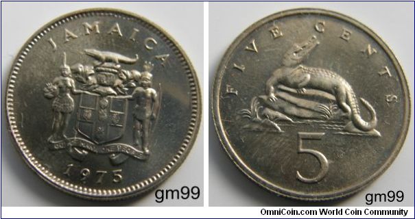 5 Cents (Copper-Nickel) : 1969-1989
Obverse: Coat of Arms, crocodile on crested shield, man with bow on right, bare-breasted woman with shield on left, both in grass skirts, legend on banner below,
JAMAICA OUT OF MANY ONE PEOPLE date
Reverse: Crocodile on rock left, head up with jaws open looking back,
 FIVE CENTS 5