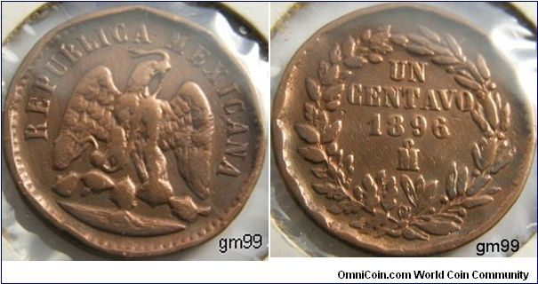 UN CENTAVO
Obverse: Eagle standing facing right on cactus, snake in beak,
 REPUBLICA MEXICANA. Reverse:Wreath around Value and 
 date, Mintmark: Mo