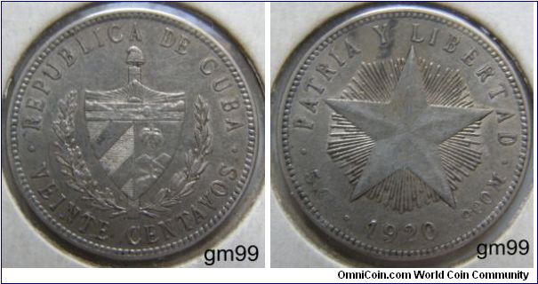Cuba (KM-13.2) 20 Centavos (Silver) : 1915-1949
Obverse: Legend: REPUBLICA DE CUBA VEINTE CENTAVOS,
Desc: Shield with sprigs either side
Reverse: Legend: PATRA Y LIBERTAD 5 G date 900 M,
 Desc: Star with rays