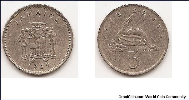 5 Cents
KM#46
2.8000 g., Copper-Nickel, 19.4 mm. Ruler: Elizabeth II Obv:
Arms with supporters Rev: American crocodile above value