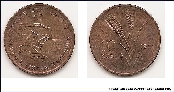 10 Kurus
KM#898.1
3.5000 g., Bronze Series: F.A.O. Obv: Atatürk driving a tractor Rev: Oat stalks divide value and date