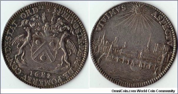 Nice higher grade silver jeton issued for the third term in office of M'sieu Pomereu, Lord Provost (Mayor)of Paris in 1682. Nice early city view of Paris showing Chatelet and Notre Dame.