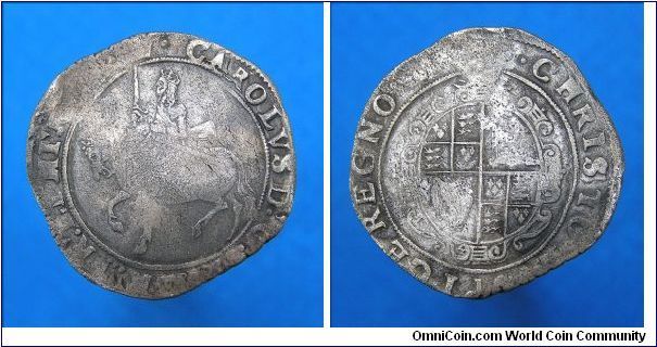 Charles I Halfcrown, mm Crown. This is a
RARE type 3b variety. Plume over shield on reverse. A little flat in areas but overall lots of detail remains in key areas.