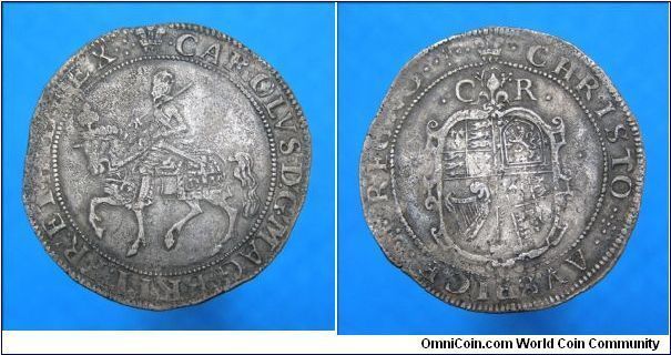 Charles I Halfcrown, mm Plume. Lis over Rose on the reverse, quite a RARE mule. Notice how the detail in the 4th quarter has slipped on the reverse. A lovely error.