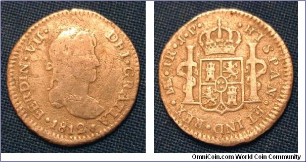 Ferdinand VII 1 reale of Spain minted in Lima, Peru. I can't get enough of these old beat up coins. So much history behind them.