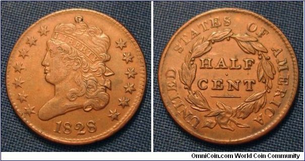 1828 13 star obverse half cent. Center dig above liberty but overall a pretty decent coin. A low Xf or so. I would net it at mid Vf because of the dig.