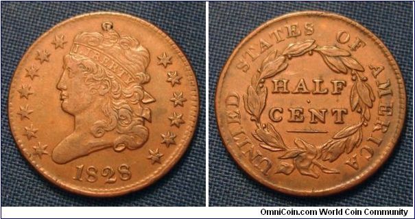 1828 13 star obverse half cent. Center dig above liberty but overall a pretty decent coin. A low Xf or so. I would net it at mid Vf because of the dig.