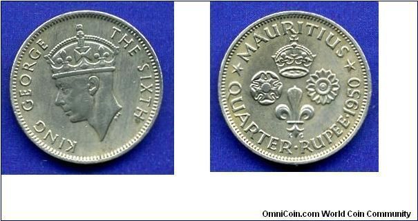 1/4 Rupee.
George VI (1936-1952) King.
Mintage 2,000,000 units.


Cu-Ni.
