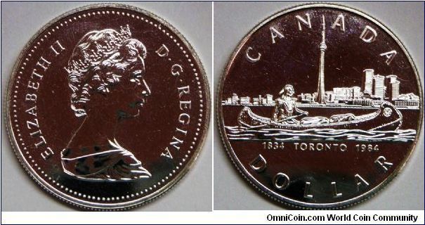 Elizabeth II, 1 Dollar, 1984. 23.3276 g, 0.5000 Silver, .3750 Oz. ASW. 36mm. Subject: Toronto Sesquicentennial. BU.