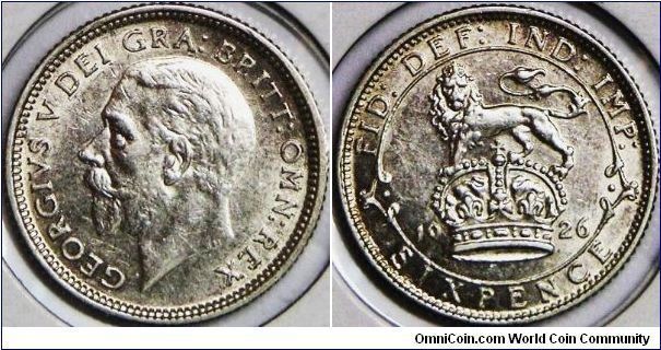 George V, 6 Pence, 1926. 2.8276 g, 0.5000 Silver, .0455 Oz. ASW., 19.5mm. Mintage: 21,810,000 units. Choice AU. [SOLD]