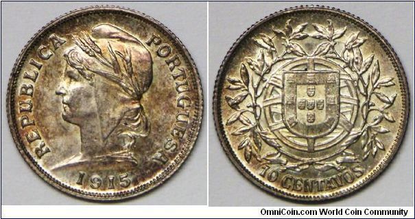 Republic, 10 Centavos, 1915. 2.5g, 0.8350 Silver, .0671 Oz. ASW. Obserse: Liberty head left. Reverse: Shield within designed circle within wreath. Mintage: 3,418,000 units. Nicely toned, Choice UNC.