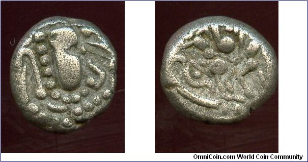Silharas of Khankan 
1000 to 1200
Silver drachm,  Anonymous 
15 mm, 3.6 gm. 
Stylized Sasanian-like bust, right, corrupt and stylized Brahmi legend   
Stylized horseman spearing two fallen enemies.