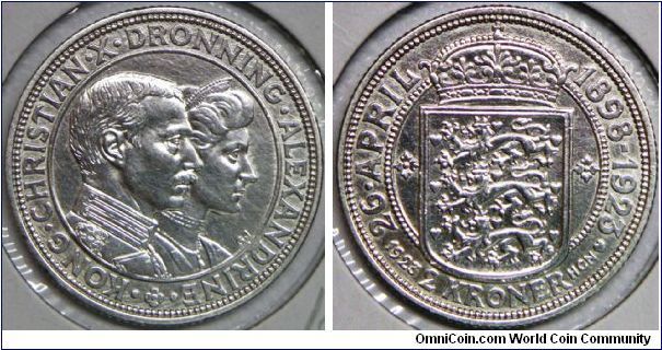 Kingdom - Christian X (1912 - 1947), 2 Kroner, 1923. 15.0000 g, 0.8000 Silver, .3858 Oz. ASW., 31mm. Subject: Silver Wedding Anniversary. Obv: Heads of Christian X and Queen Alexandrine. Rev: Crowned arms within anniversary dated. Mintage: 203,000 units. AU.