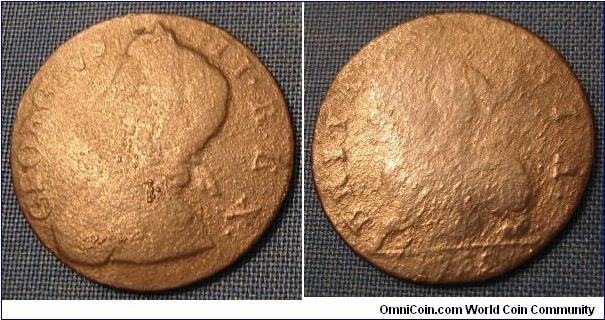 1735 George II half penny. Looks like a ground recovery.