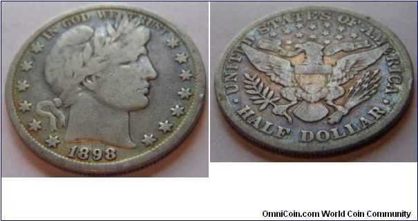 Half Dollar, no mint mark.  Different photographs of the same 1898 half already posted, but these show the toning a little better. The toning is the reason I really like this coin.  It has personality!