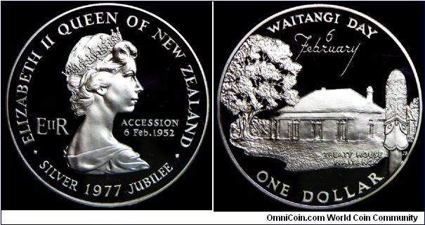 Queen Elizabeth II, One Dollar, 1977. 27.2160 g, 0.9250 Silver, .8095 Oz. ASW., 38.8mm. Subject: Waitangi Day and Queen's 25th Anniversary. Rev: Treaty House. Mintage: 27,000 units. PROOF.
