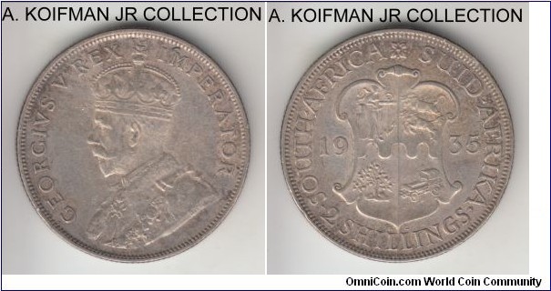 KM-22, 1935 South Africa 2 shillings; silver, reeded edge; George V, very fine or so, previous cleaning mostly re-toned now, small scratch/graffity by the King's face.