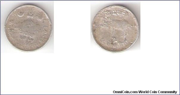 Nepal

Year: 1968
Denomination:5 Paisa
Metal: Aluminium

Obverse: Hindu Religious Symbols
Reverse: Cow