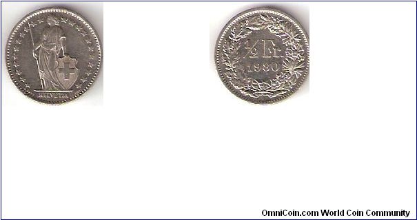 Switzerland

Year: 1980
Denomination:
1/2 Frank

Obverse: Helvetia
Reverse: Denomination