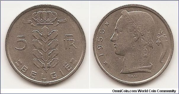 5 Frank 
KM#135.1
6.0000 g., Copper-Nickel, 24 mm. Obv: Plant divides
denomination, Crown at top, legend in Dutch Obv. Leg.: BELGIE
Rev: Laureate head, left, small diamonds flank date at left, symbol
at right Edge: Reeded