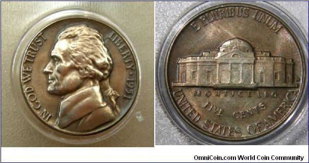 Thomas Jefferson Nickel, 5 Cents. 1951D-Mintmark: D (for Denver) to the right of the building on the reverse
Nice Toned coin. Full head of hair, Full steps.
Metal content:
Copper - 75%
Nickel - 25%