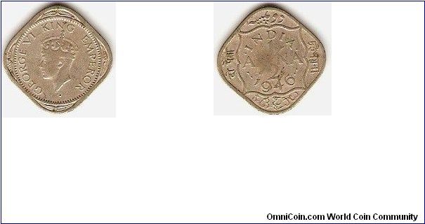 British India 
1/2 anna 
George VI king emperor 
.INDIA. (with dots before and after INDIA) 
Calcutta Mint (with dot in dashes before and after date)
copper-nickel