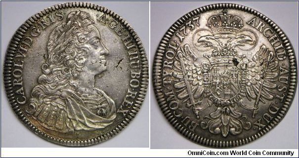 Karl (Charles) VI, Thaler, 1737. 28.2100 g, Silver, 42mm. Mint: Hall. Mintage: 246,000 units. Flan flaws, otherwise extremely fine.