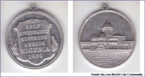 1959, Nigeria Self Government Northern region medal; aluminum, plain rim, a bit of toning but otherwise uncirculated medal; have no backgroun, will be interested to know more if you have any information.