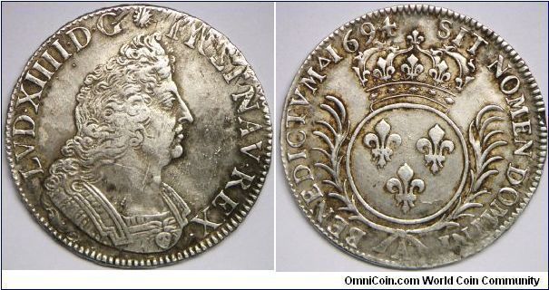 Louis XIV (1643 - 1715), ECU, 1694. 27.1800 g, Silver, 40mm. Mint: Paris. Choice very fine to about extra fine. Some adjustment marks on the Obverse (Note: This clear example struck on new planchet. Usually this type of example struck over recalled ECU. Clear examples struck on new planchets command an average 20-30% premium). Scarce in this condition.