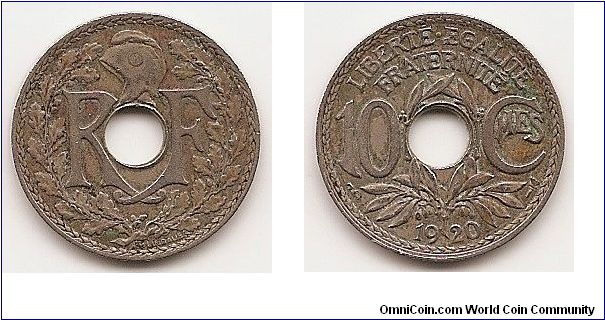 10 Centimes
KM#866a
4.0000 g., Copper-Nickel, 21.3 mm. Obv: Center hole divides
monogram, liberty cap above, wreath surrounds Rev: Center hole
and plant divides denomination, date below Note: Varieties with
small and large hole exist