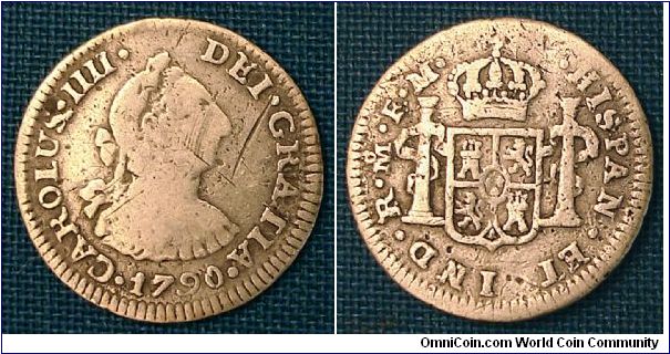 This is a one year type (1790) transitional half-reale of King Charles IIII with King Charles III bust. KM#71.
11.5mm, 1.6g, Mo Mexico City mint Mexico, Assayer F.M.