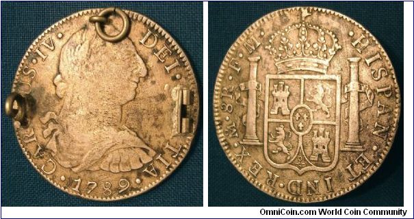 8 reale King Carolus IV (Charles IV) with King Charles III head. This type was minted 1789 and 1790 only. KM#107
26.84g a little small at 38mm but minted in Mexico City (Mo) Mexico, most from there are 38mm and not 39mm and are much more round.
Assayer F.M.