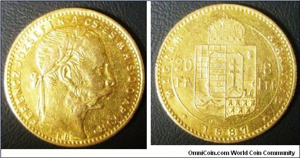 Franz Joseph I, 8 Forint 20 Francs, 1887KB. 6.4516 g, 0.9000 Gold, .1867 Oz. AGW. Obv: Larger Head. Mintage: 294,112 units. XF.