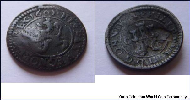 Copper Maravedi coin of Spain, Phillip III. Counterstamped on the 'Reverse' side, unable to make out details. 

Mint mark is 'C', Cuernca.