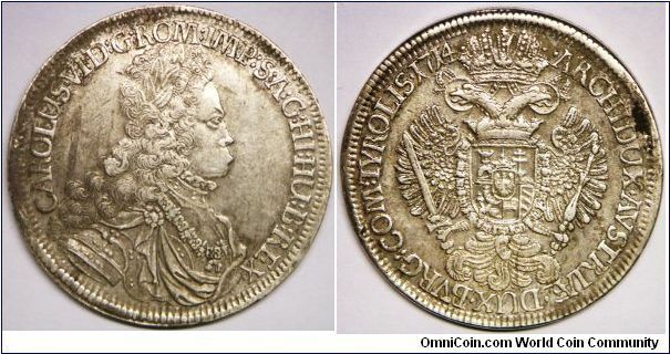 Karl (Charles) VI (1711 - 1740), Thaler, 1714. Obverse: Legend begins at lower left. Reverse: Imperial double eagle with arms on breast. 28.8600 g, Silver, 42mm. Mintage: 111,000 units. Good very fine.