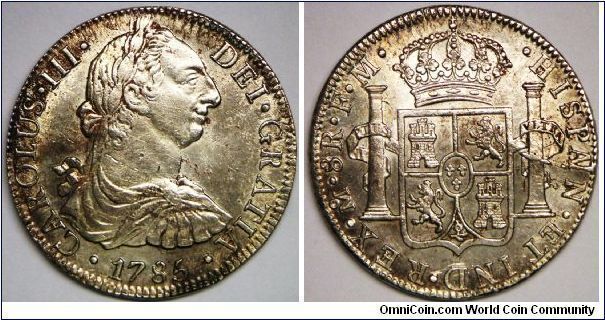 Spanish Colony, Charles III (1759 - 1788), 8 Reales, 1785 FM. 27.0674 g, 0.8960 Silver, .7797 Oz. ASW. Mint: Mexico City. Die crack on reverse 3 1/2 o'clock. VF.