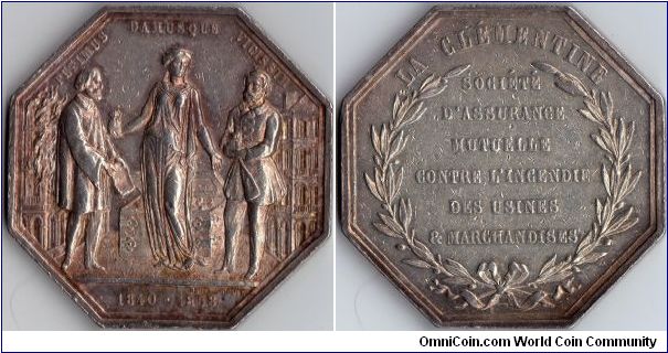 Silver octagonal jeton de presence issued for La Clementine, a French fire insurance (mutual) company during the 19th century.