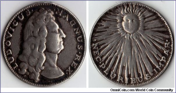 Silver medalet of Louis XIV (obverse) and the sun (reverse). Louis XIV was styled as being `without equal' and the `sun king'. This medalet mimics a jeton originally issued in 1658 for the ordinaire des guerres but the bust of Louis XIV is much later.