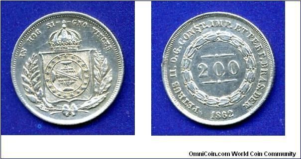 200 reis.
Imperio Do Brazil.
D. Pedro II (1831-1889) Constitucional imperador do Brasil.


Ag917f. 2,55gr.