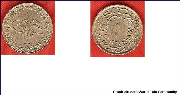 1/10 qirsh
in the name of Muhammad V
accession year 1327AH
regnal year 4
copper-nickel
Heaton Mint