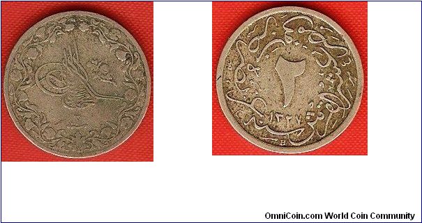2/10 qirsh
in the name of Muhammad V
accession year 1327AH
regnal year 2
copper-nickel
Heaton Mint