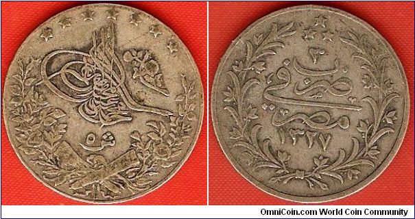 5 qirsh
in the name of Muhammad V
accession year 1327AH
regnal year 3
0.833 silver
Heaton Mint