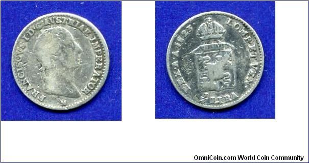 1/4 Lira.
Austrian Lombardia & Venetia.
Francisc I (1806-1835).
Austrian empire.
(M) Milan mint.


Ag600f. 1.62gr.