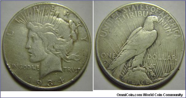 1934S Peace Dollar, Some rim hits can be seen.