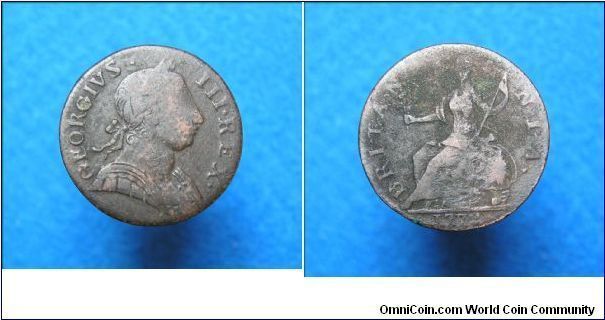 Halfpenny contemporary counterfeit.

Young Head,
Closed G's